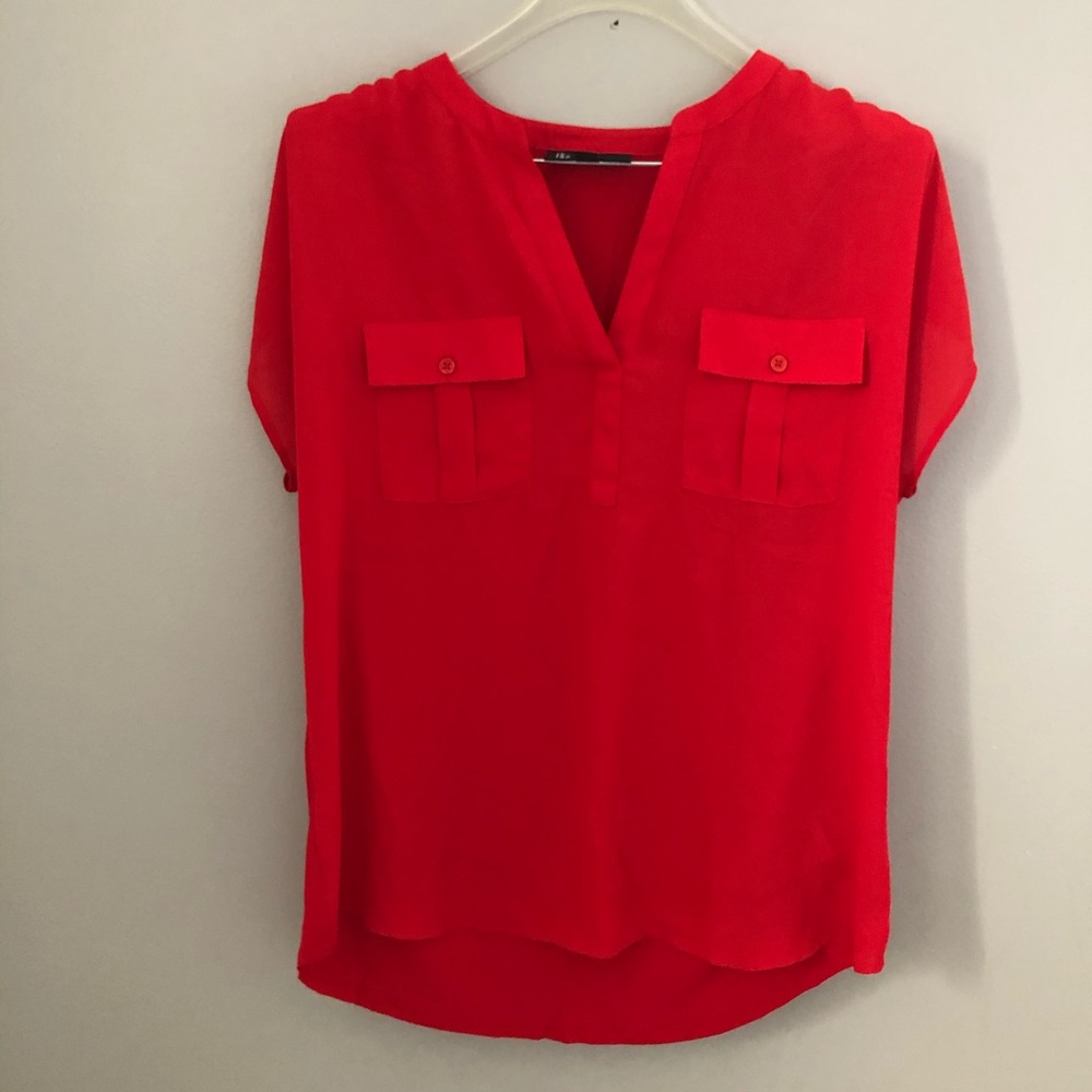 High low red short sleeve shirt
